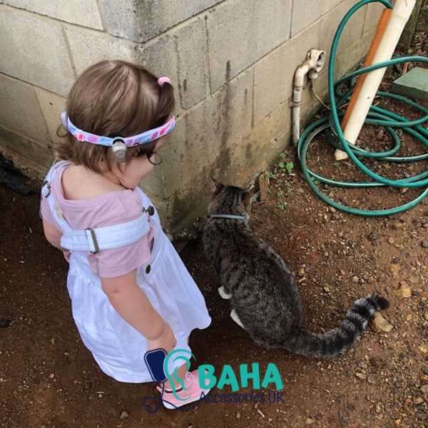 girl wearing a baha headband
