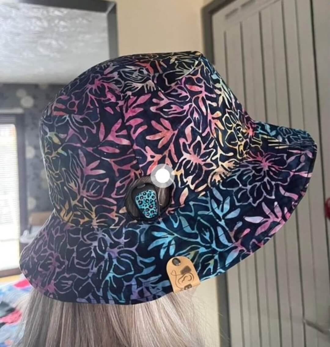 a baha bucket hat with leaf pattern